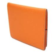 Pre-owned Oransje Hermes lommebok i skinn