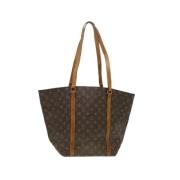 Pre-owned Brunt lerret Louis Vuitton Sac Shopping