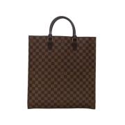 Pre-owned Brunt lerret Louis Vuitton flat veske