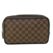 Pre-owned Brunt lerret Louis Vuitton toalettmappe