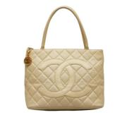 Pre-owned Beige Laer Chanel Medaillon