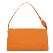 Pre-owned Oransje skinn Louis Vuitton Clutch tilbehor