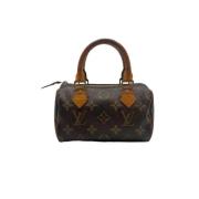 Pre-owned Brunt lerret Louis Vuitton Speedy