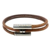 Pre-owned Brunt Hermes-armband i skinn