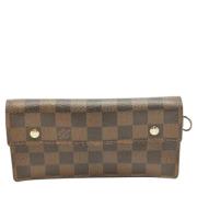 Pre-owned Brunt belagt lerret Louis Vuitton lommebok