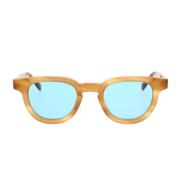 Stilige solbriller med ravfarget innfatning og blå linser