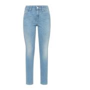 Smal passform jeans med bleket denim og sand overflate