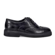 Raffinerte svarte flate sko