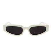 Geometriske solbriller med elfenbensfarget innfatning og grå linser