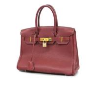 Pre-owned Fabric handbags