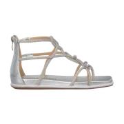 Glitrende flat sandal med glidelås