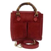 Pre-owned Suede handbags