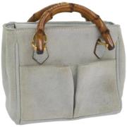 Pre-owned Suede handbags