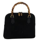 Pre-owned Suede handbags