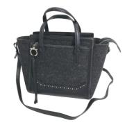 Pre-owned Fabric handbags