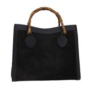 Pre-owned Suede handbags