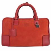 Pre-owned Suede handbags