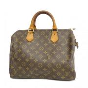 Pre-owned Fabric handbags