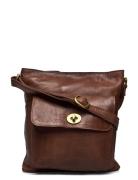 Kay Urban Brown RE:DESIGNED EST 2003