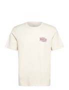 Small Graphic Tee Cream Wrangler