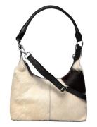 Jia Small White RE:DESIGNED EST 2003