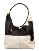 Jia Big Black RE:DESIGNED EST 2003