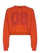 Cropped Long-Sleeved T-Shirt Orange Monki