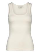 Cmsiv-Top Is A Tight-Fitting Top In A Thick And Stretchy Material With...
