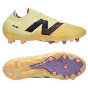 New Balance Tekela V4 Pro Lav FG Energy Rush - Pergament/Svart/Oransje